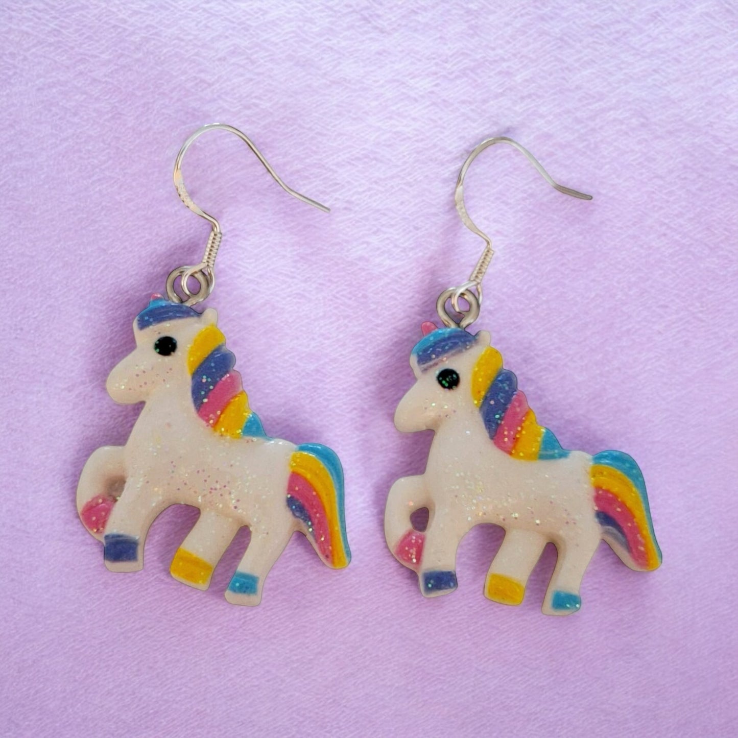 White Unicorn Dangly Earrings - Premium from Uniquely Holt - Just £4.99! Shop now at Uniquely Holt