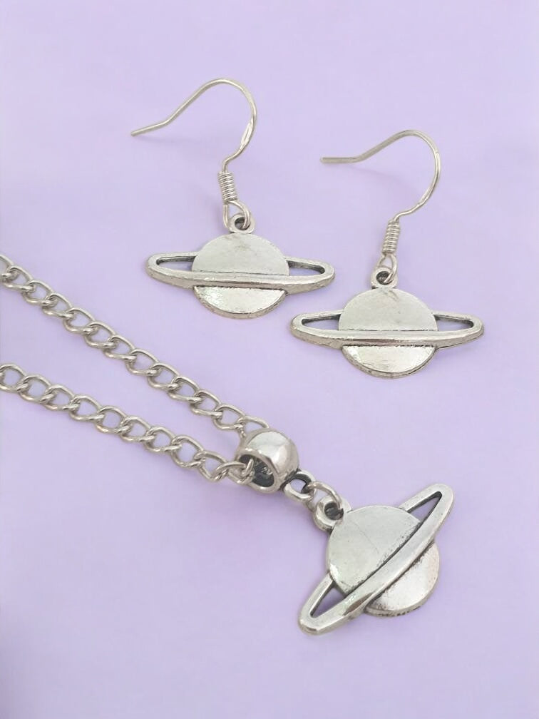 Saturn Charm Jewellery Set, Dangly Earring And Necklace Set In Gift Bag, Cord Or Chain Options - Premium from Etsy - Just £8.99! Shop now at Uniquely Holt