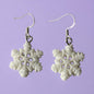 Snowflake dangly earrings