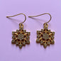 Snowflake dangly earrings