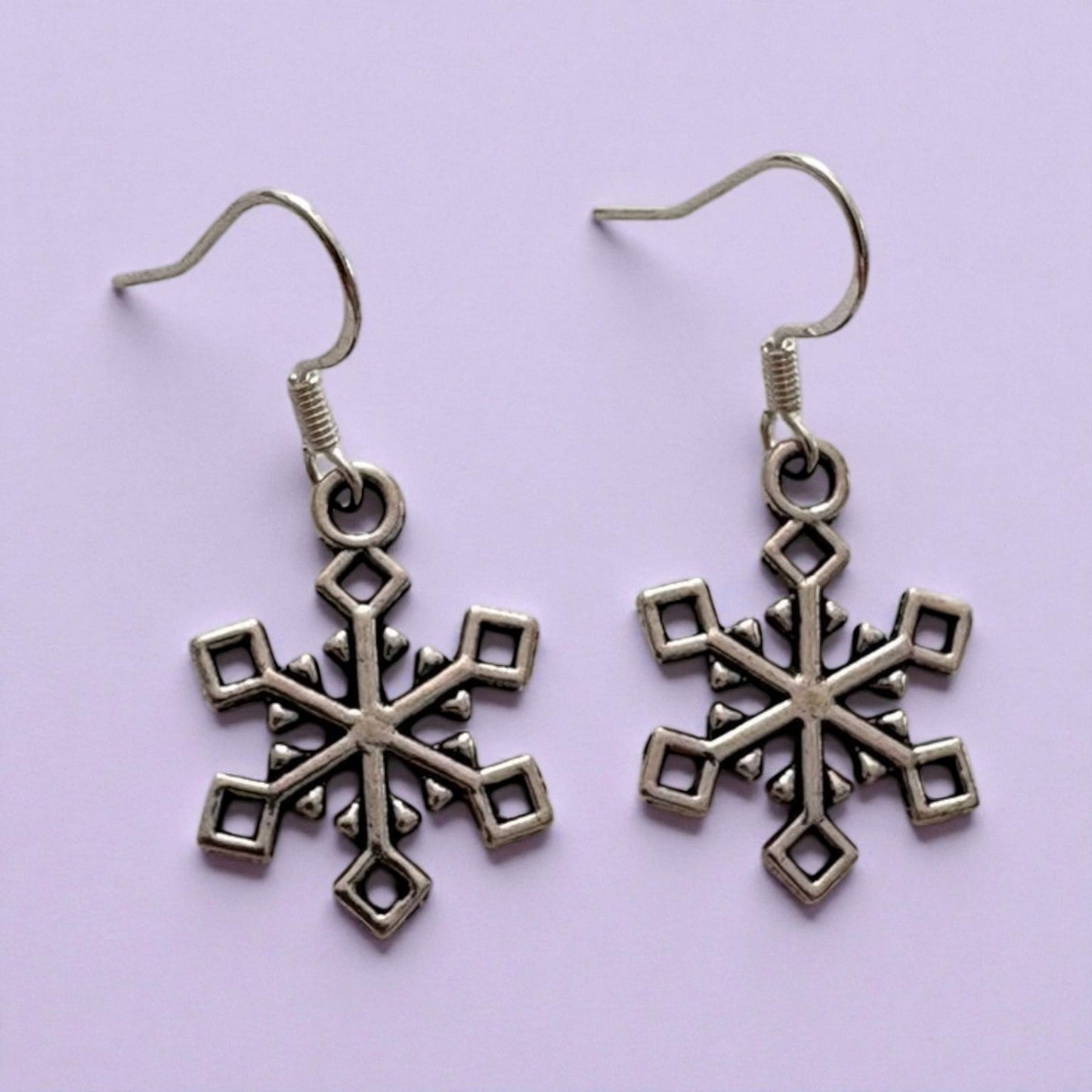 Snowflake dangly earrings