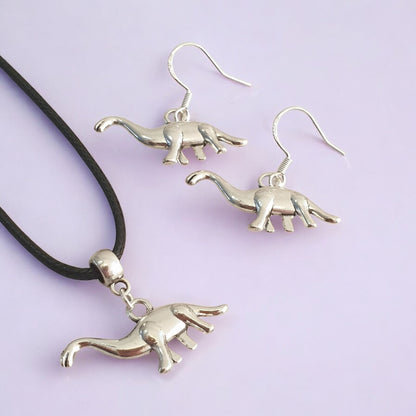 Dinosaur Charm Jewellery Set, Dangly Earring And Necklace Set In Gift Bag, Cord Or Chain Option - Premium  from Etsy - Just £8.99! Shop now at Uniquely Holt