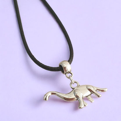 Dinosaur Charm Necklace Silver Plated Or Waxed Cord Variable Lengths, Gift Packaged - Premium  from Etsy - Just £5.49! Shop now at Uniquely Holt