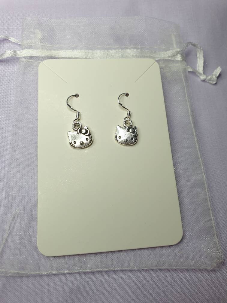 Handmade Antique Silver Hello Kitty Inspired Dangly, Charm Earrings In Gift Bag - Premium  from Etsy - Just £5.99! Shop now at Uniquely Holt