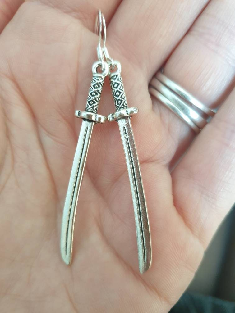 Handmade Antique Silver Sword Dangly Charm Earrings In Gift Bag - Premium  from Etsy - Just £5.99! Shop now at Uniquely Holt