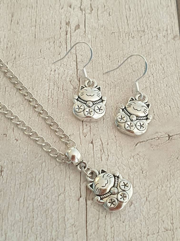 Handmade Antique Silver Chinese Lucky Cat Charm Jewellery Set, Dangly Earring And Necklace Set In Gift Bag, Cat Lover, Cord Or Chain Options - Premium  from Etsy - Just £8.99! Shop now at Uniquely Holt