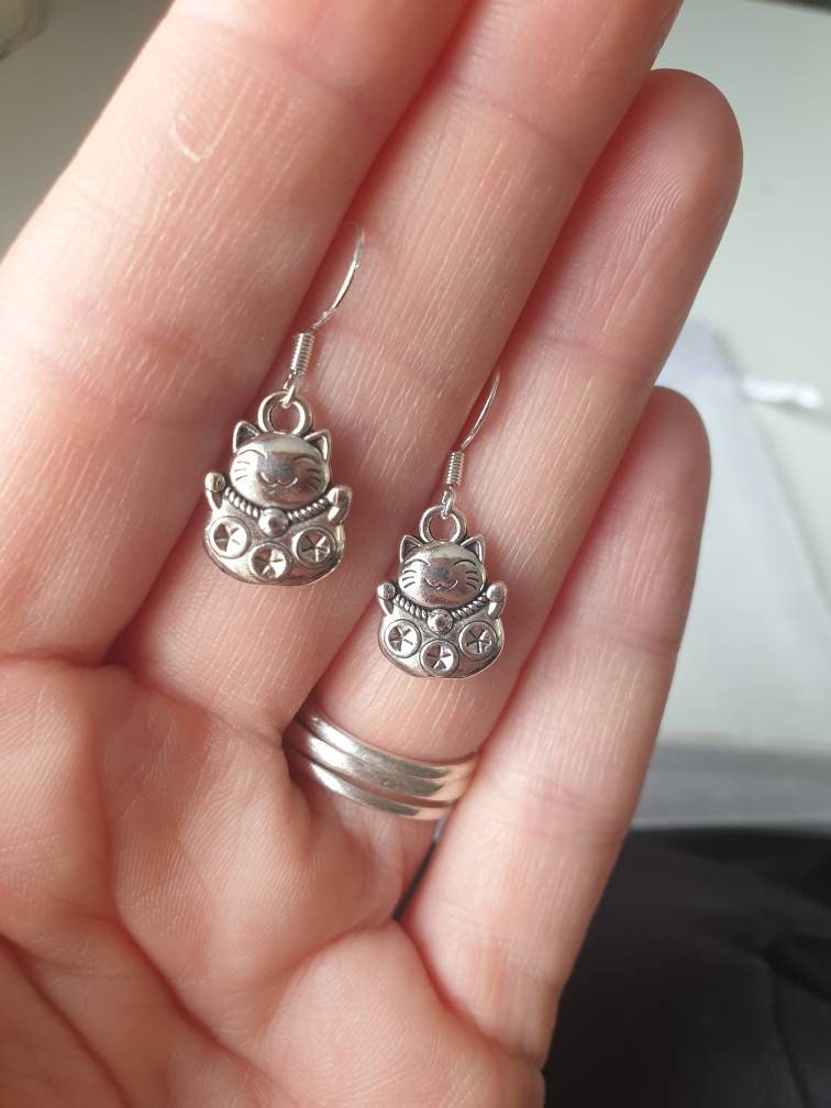 Handmade Antique Silver Chinese Lucky Cat Charm Earrings, Gifts For Her, Animal Lover, Lucky Charm, Fun Jewellery - Premium  from Etsy - Just £4.99! Shop now at Uniquely Holt