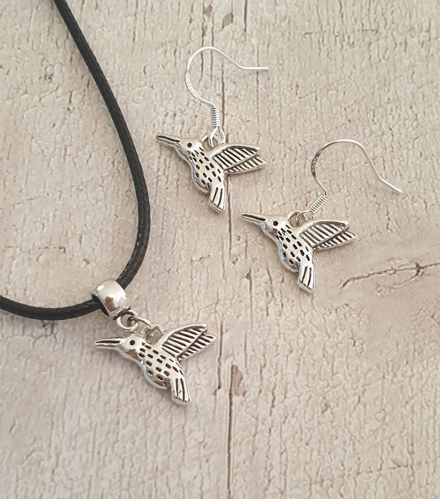 Handmade Antique Silver Humming Bird Charm Jewellery Set, Dangly Earring And Necklace Set In Gift Bag, Cord Or Chain Options - Premium  from Etsy - Just £8.99! Shop now at Uniquely Holt