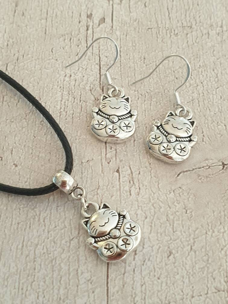 Handmade Antique Silver Chinese Lucky Cat Charm Jewellery Set, Dangly Earring And Necklace Set In Gift Bag, Cat Lover, Cord Or Chain Options - Premium  from Etsy - Just £8.99! Shop now at Uniquely Holt