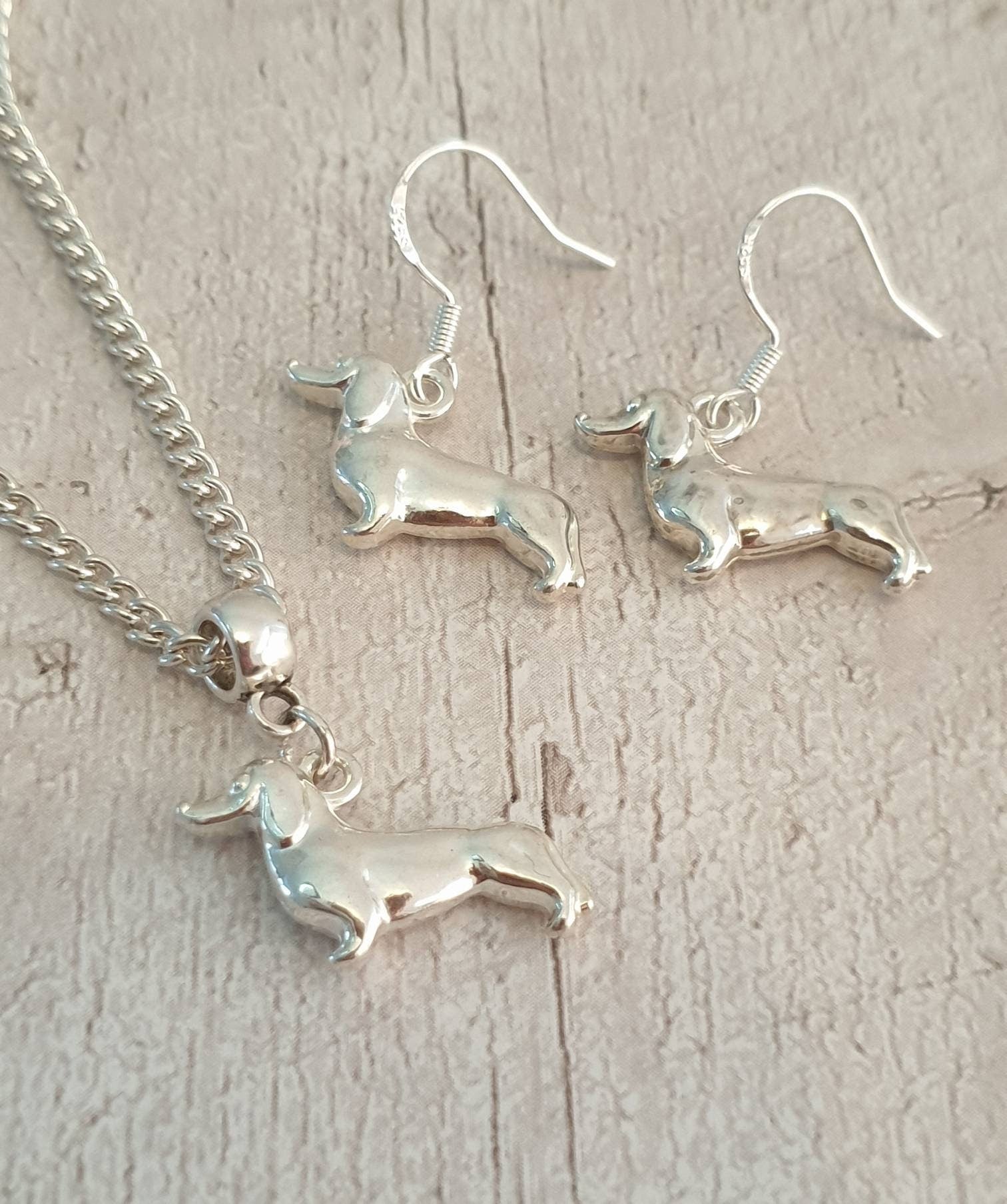 Handmade Antique Silver Dachshund Sausage Dog Charm Jewellery Set, Dangly Earring And Necklace Set In Gift Bag, Cord Or Chain Option - Premium  from Etsy - Just £8.99! Shop now at Uniquely Holt